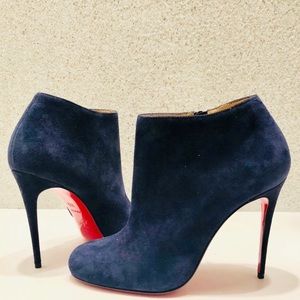 Navy blue suede Christian Louboutin booties.